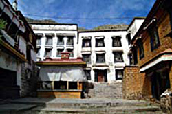 Hamdong Regional House (har gdong khang tshan). The temple is on the left, the regional house kitchen on the right, and monks’ quarters in the center.