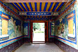 An entryway into a compound. Bati Regional House (sba ti khang tshan).